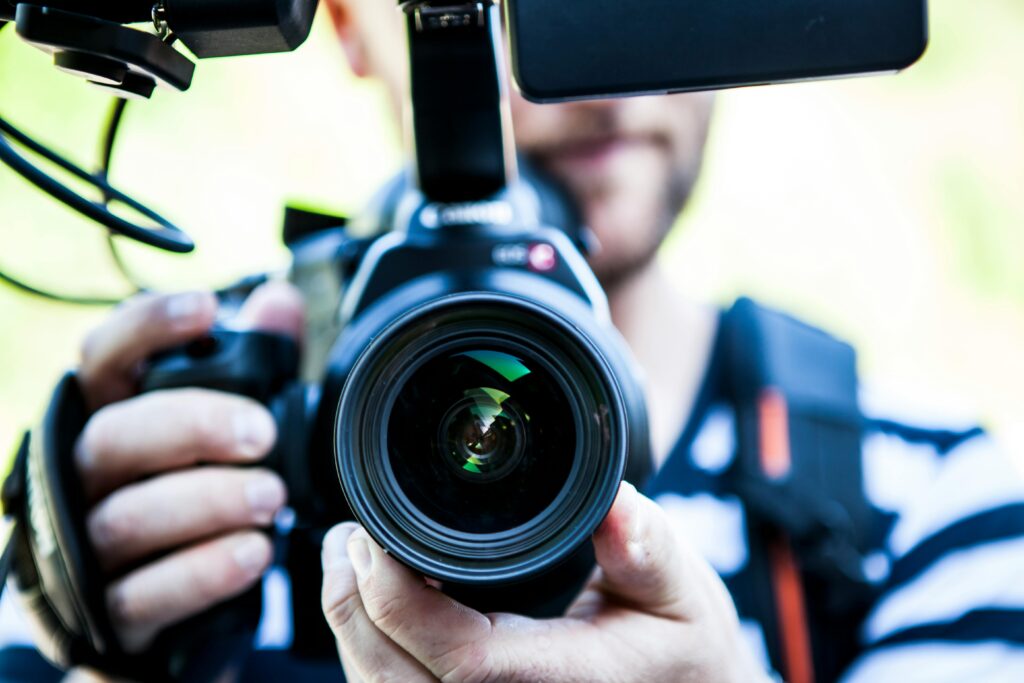 Man filming with his camera